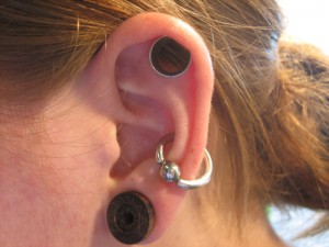 Why do my ear tunnels smell?